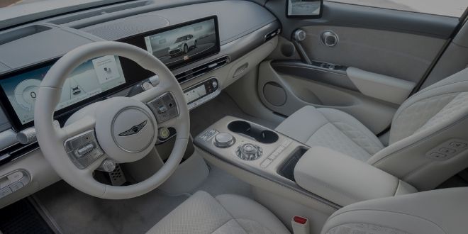Side angle of the GV60 Interior with the white interior.