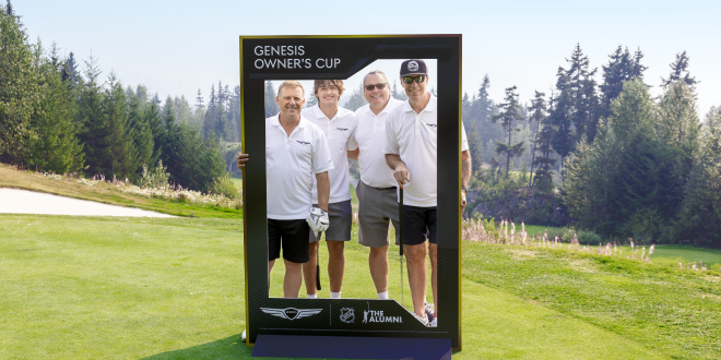 4 men on a golf course 