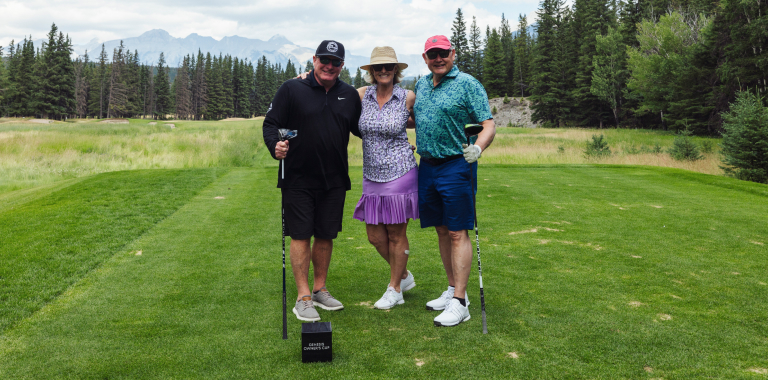 Barbara and two other golfers on a golf course