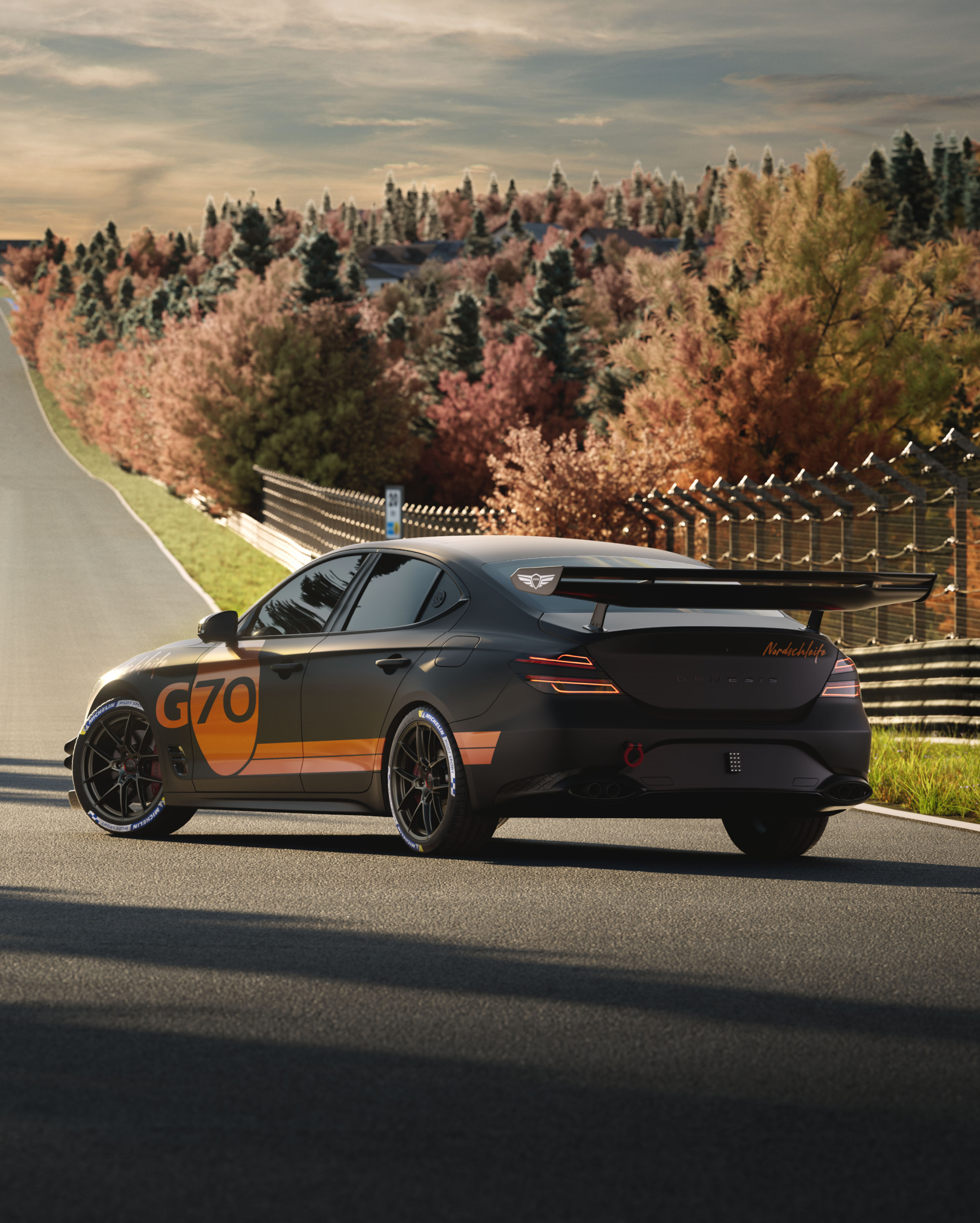 Vue arrière de la G70 Track Day Special avec un accent sur les pneus Michelin Pilot Sport 4S de 19 pouces.