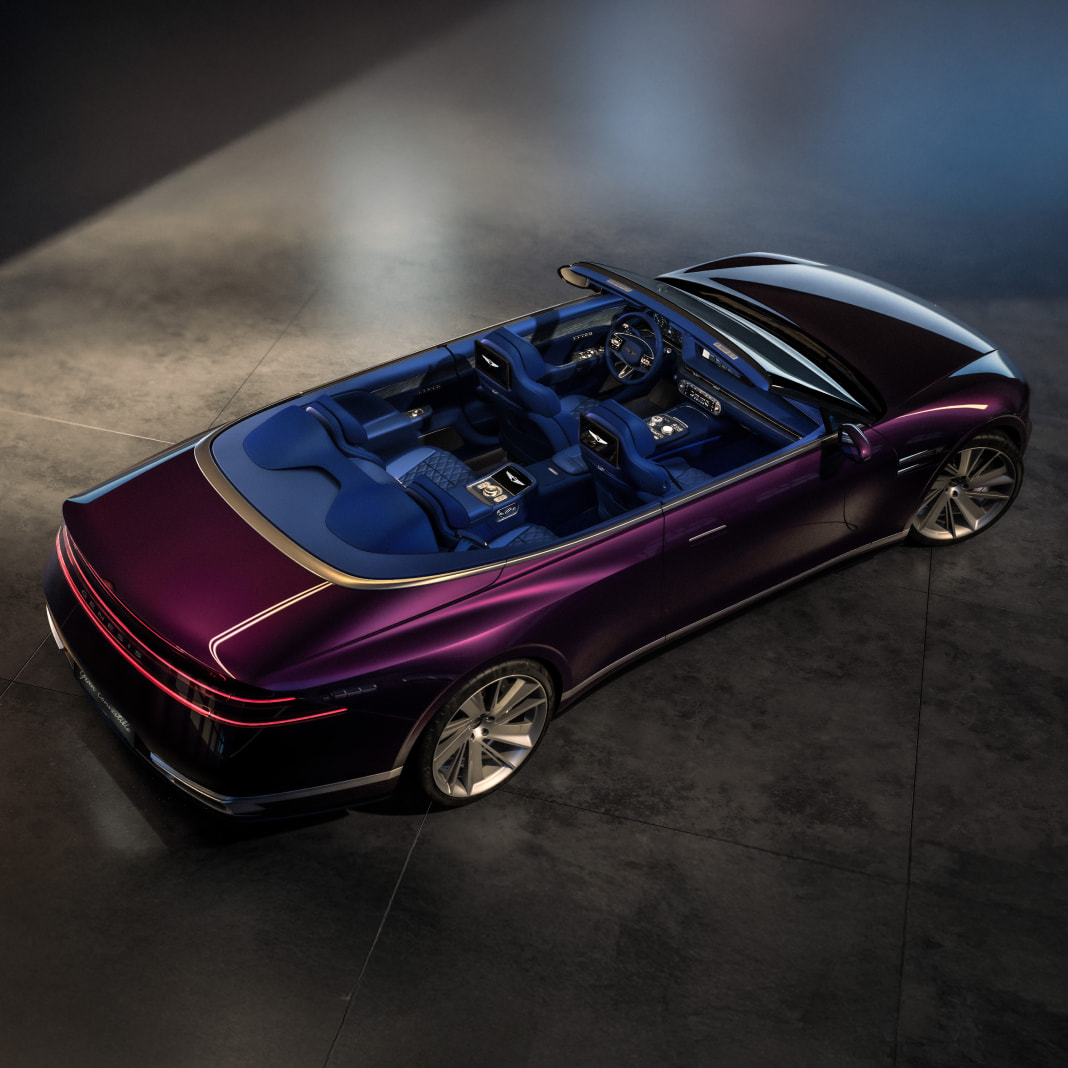 This is an aerial view of the Genesis X Gran Convertible. The interior of the vehicle is visible.