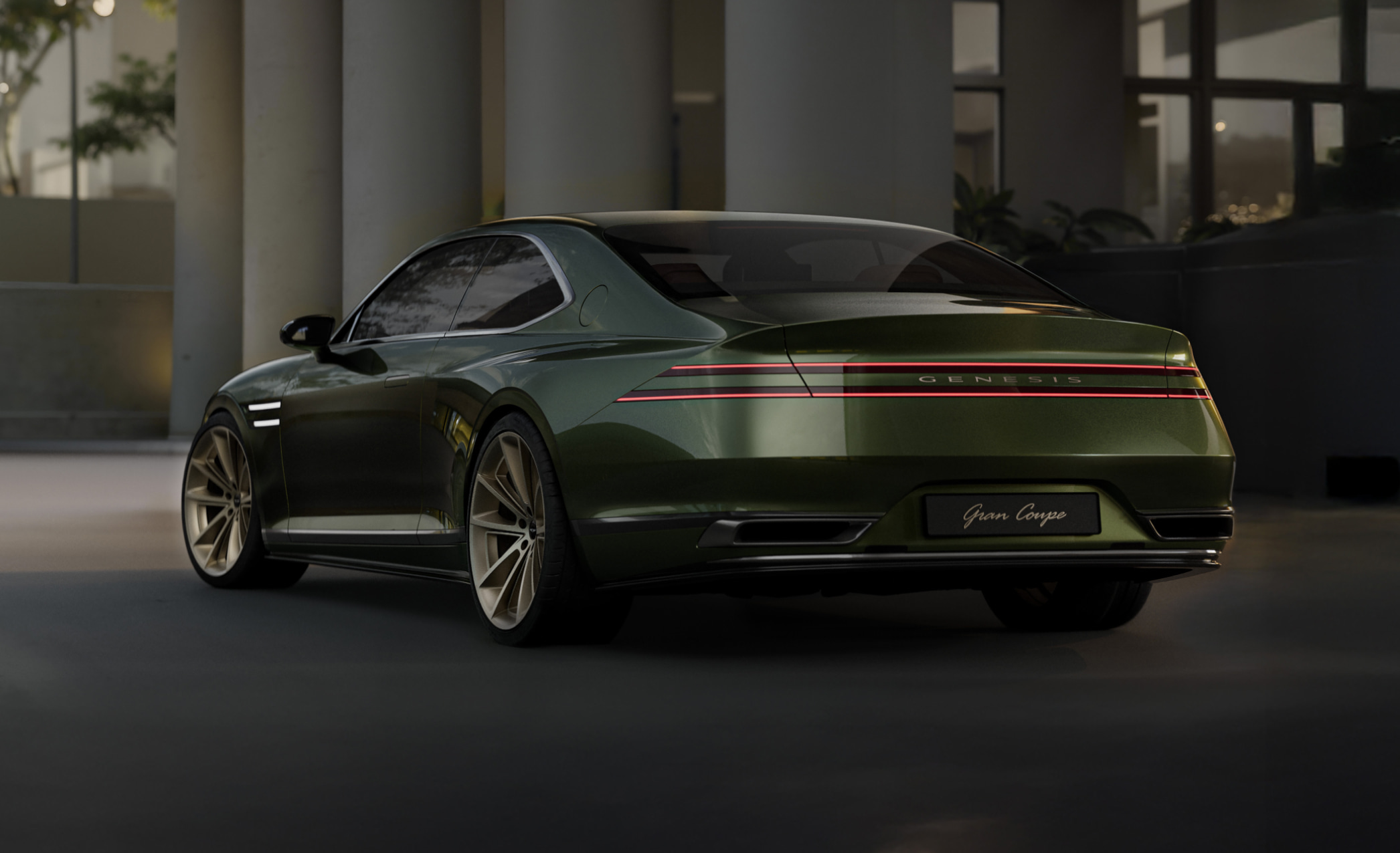 The rear of the Genesis X Gran Coupe is visible. Two lines of lamps stretch out for a long time.