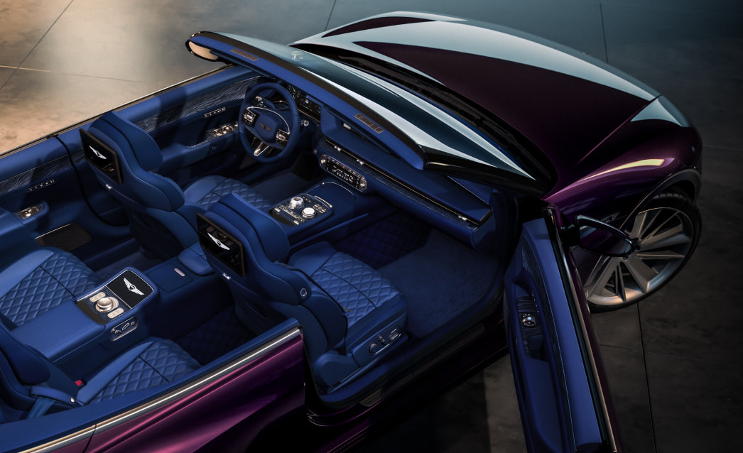 This is a view of the vehicle from above. The burgundy exterior and blackberry interior stand out.