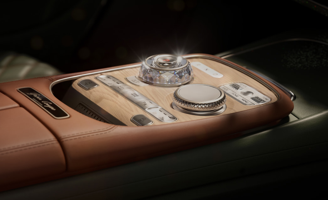 The wooden center console appears zoomed in. The Crystal Sphere electronic transmission stands out.