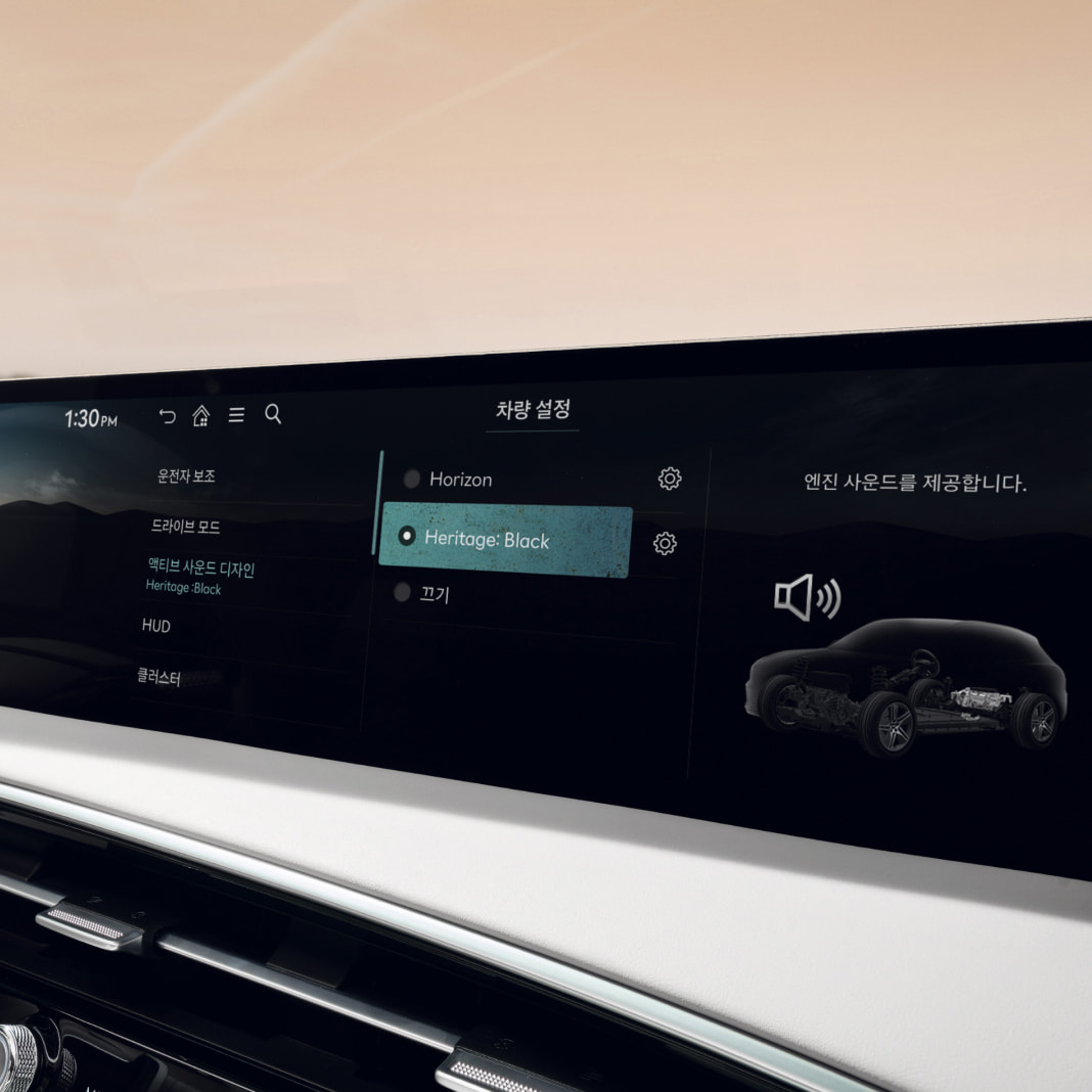 The Active Sound Design settings screen is shown on the wide display in front of the driver's seat.