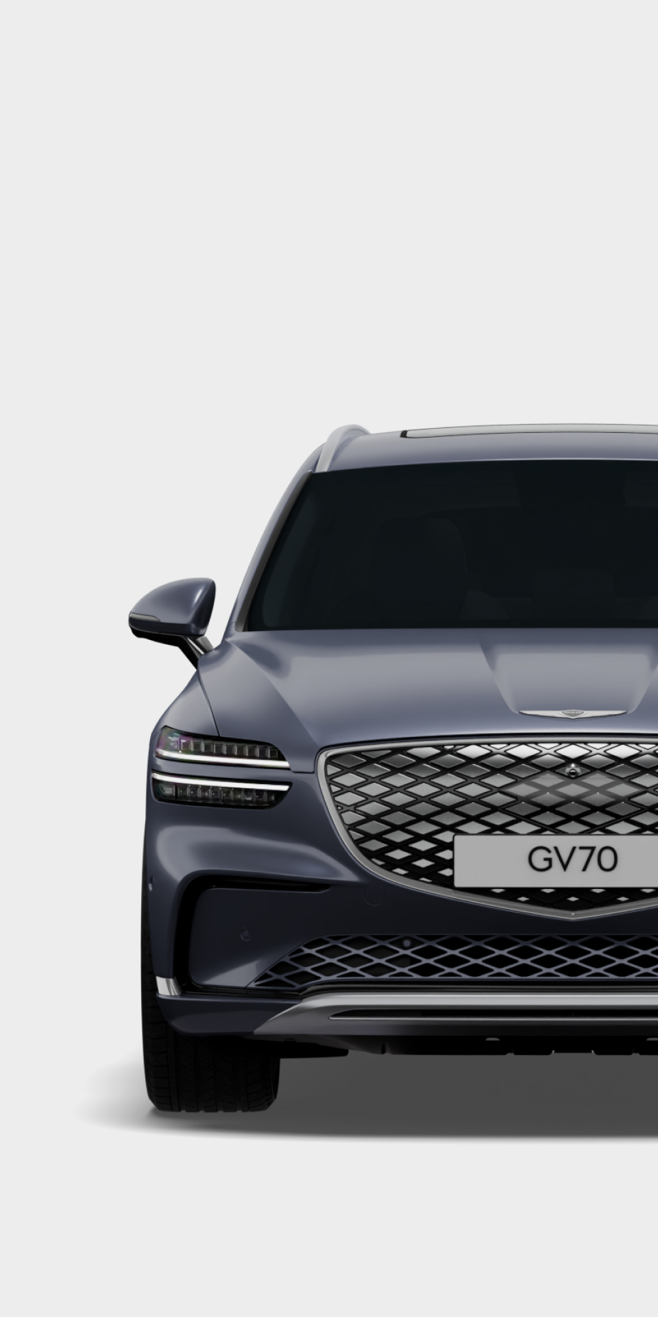 The front view of the Electrified GV70 in Ceres blue exterior color is visible.