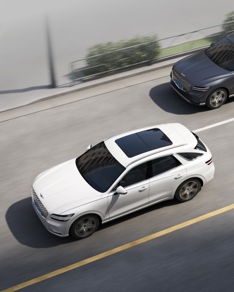 The Electrified GV70 drives down the road with a sense of speed.