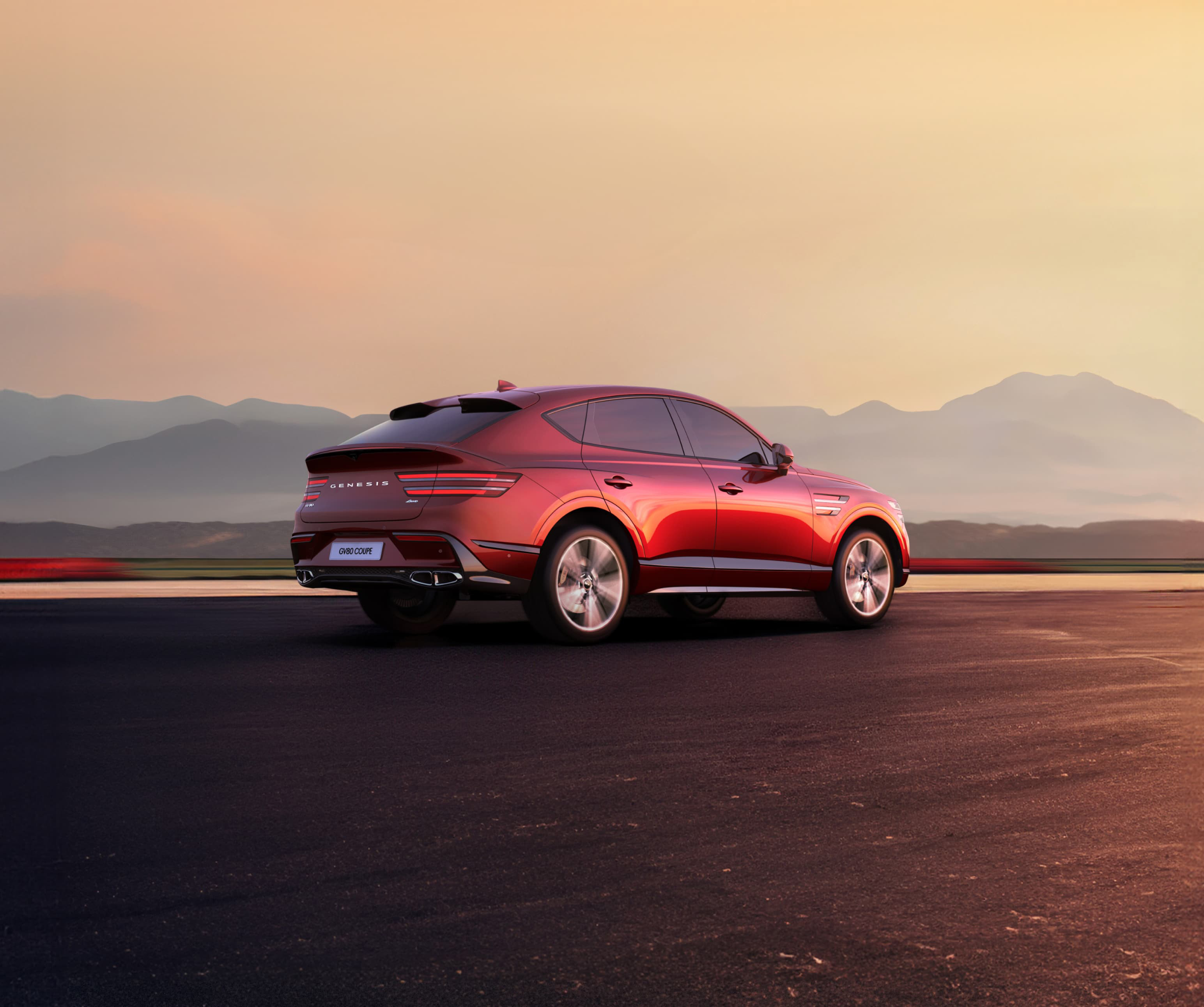 The text zooms in to reveal a Mauna Red GV80 Coupe driving fast.