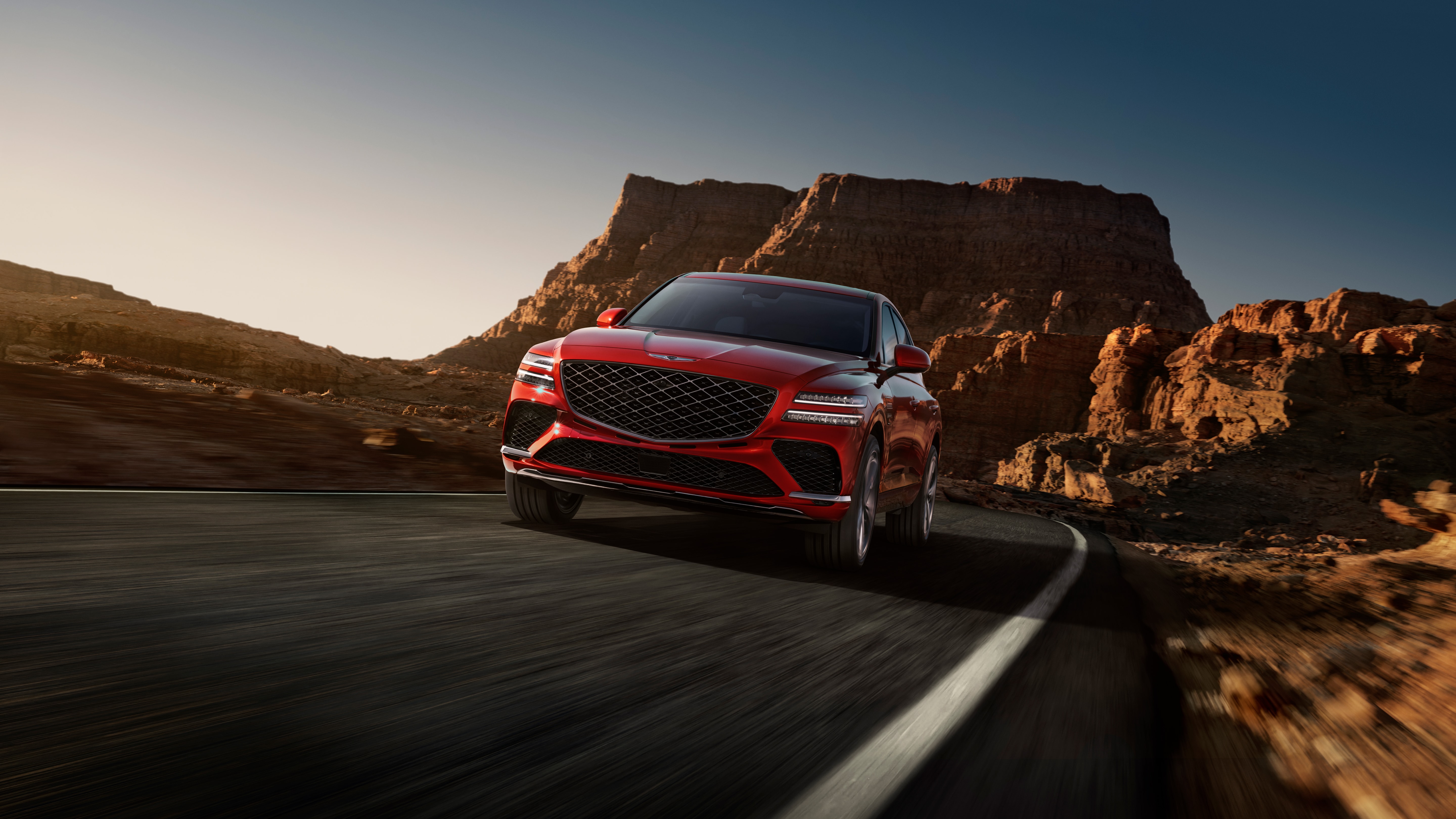 The front of the Mauna Red GV80 Coupe as it drives.