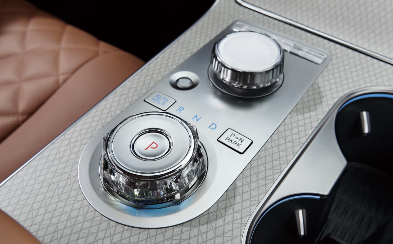 The Genesis integrated controller in the center console.