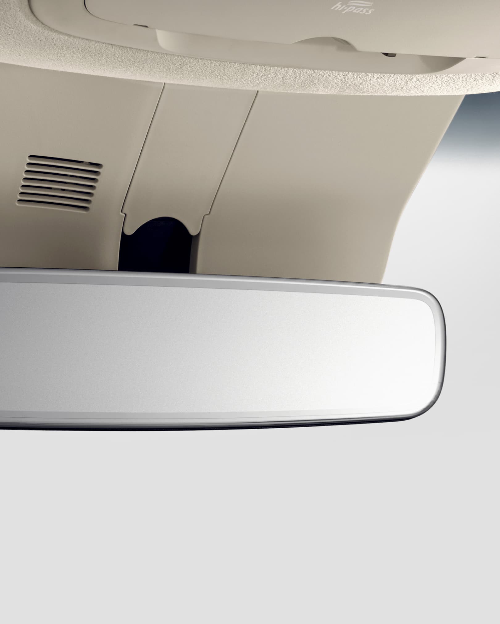 A close-up of the frameless room mirror.