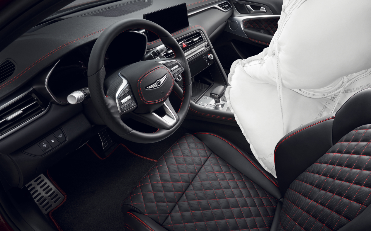 An airbag seen next to the driver's seat.