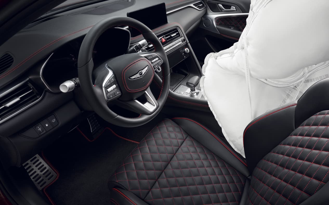 An airbag seen next to the driver's seat.