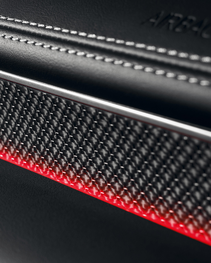 A close-up of the real carbon garnish inside G80 Sport.