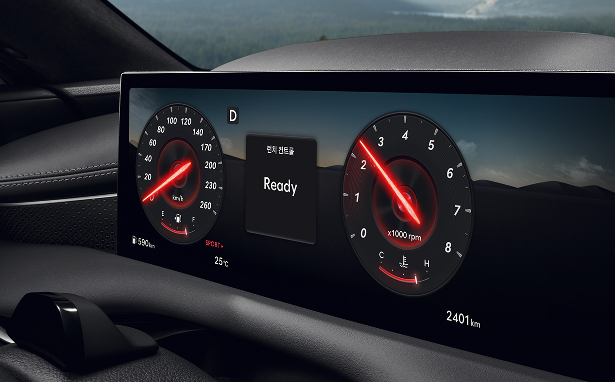 G80 Sport interior while it drives on a road.