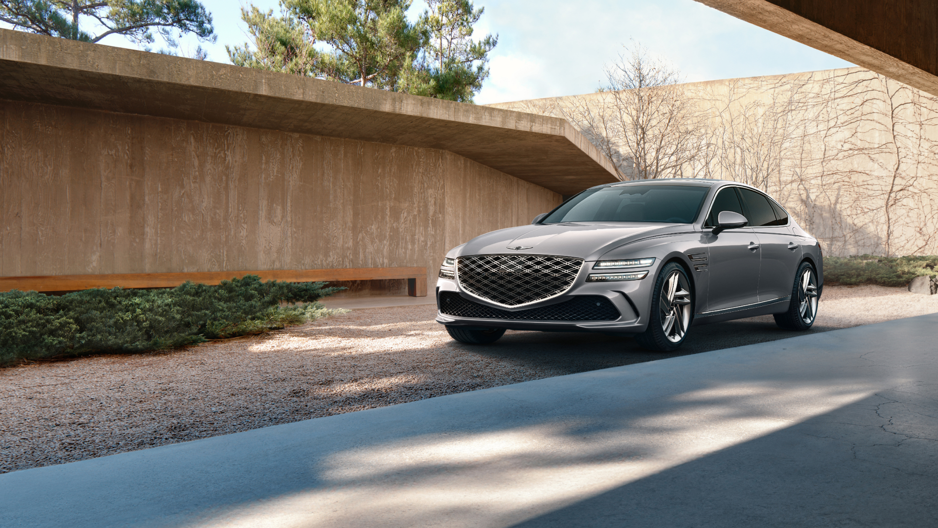 Two G80 vehicles, the Standard model and the Sport model