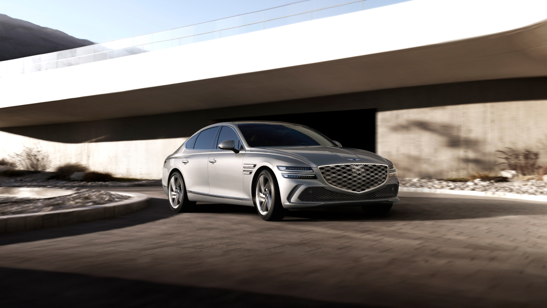 Two G80 vehicles, the Standard model and the Sport model
