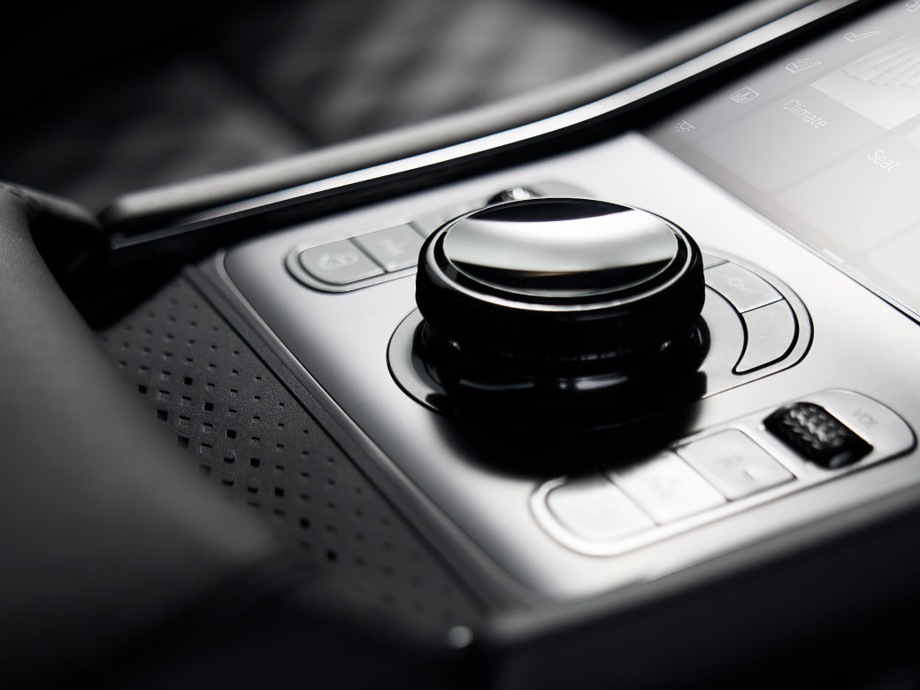 A close-up view of the rear seat integrated control panel.