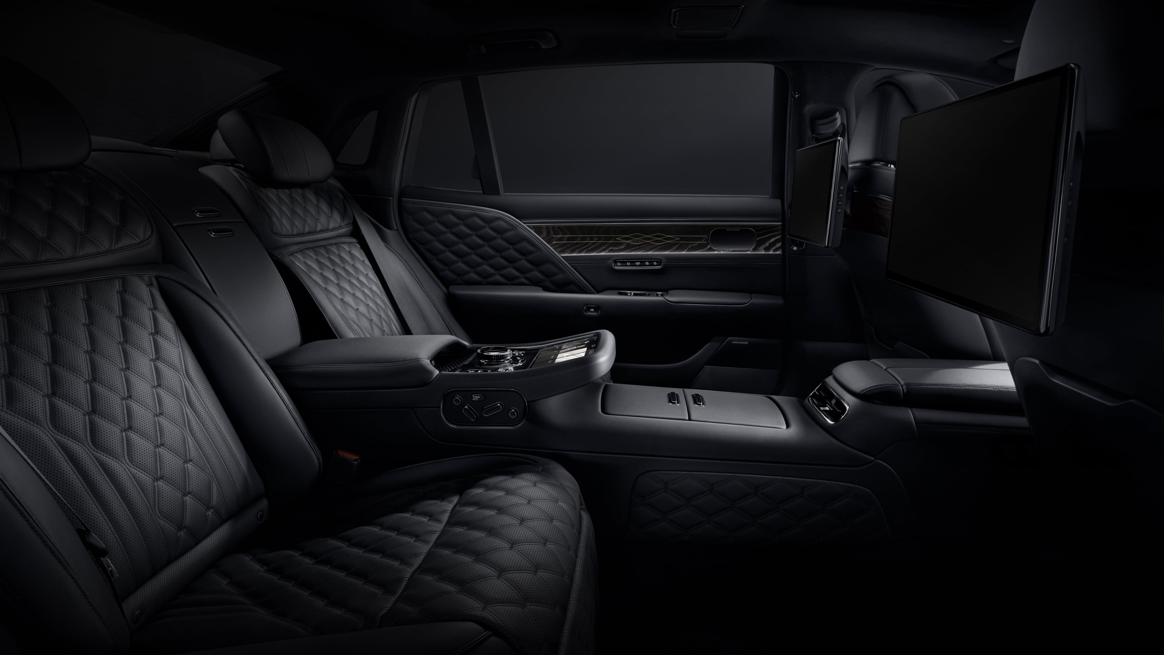 The rear seat interior unfolds from a side perspective.
