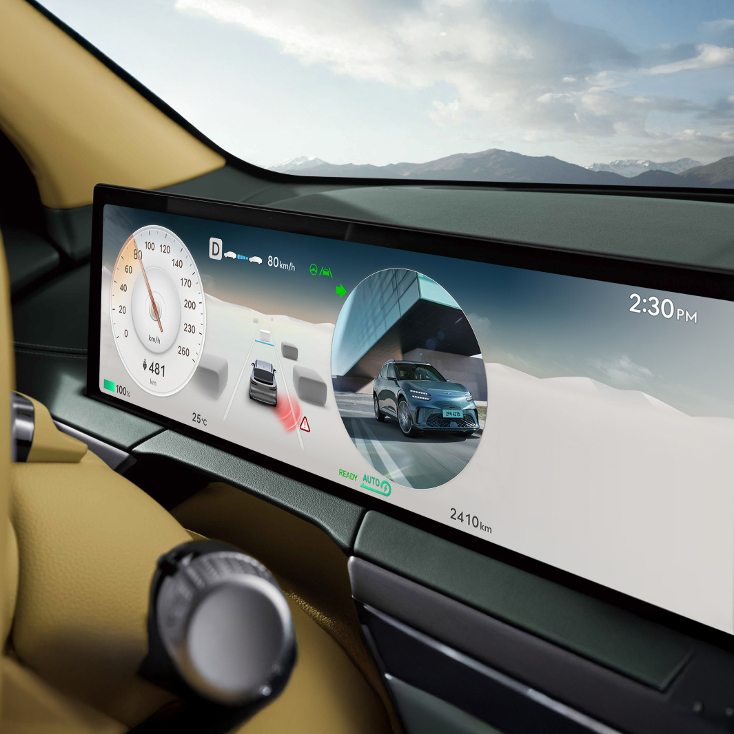 The rear and side images of the vehicle are displayed in a cluster on the front seat display screen.