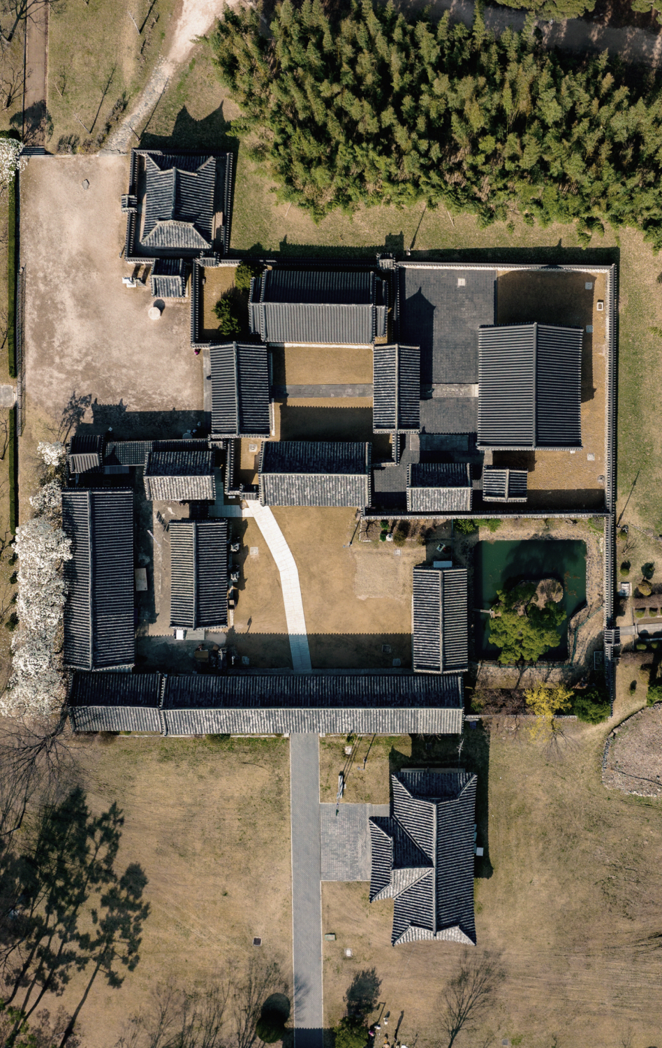 Aerial view of a traditional Korean hanok and Tuh.
